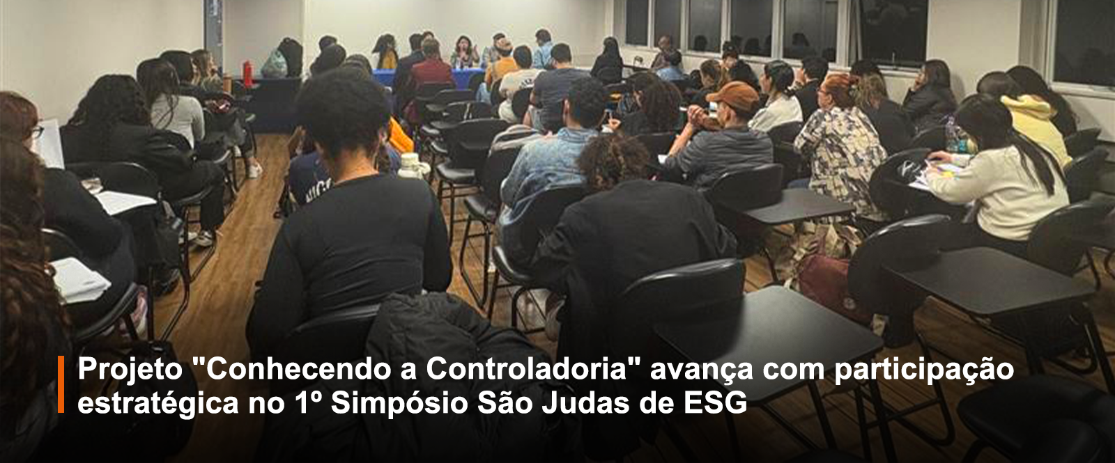 Alunos da Faculdade São Judas sentados durante palestra